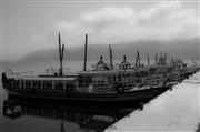 Boats on Dali lake fade : Dali, China